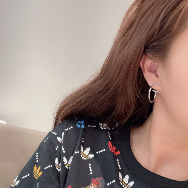 T*f*ny earrings